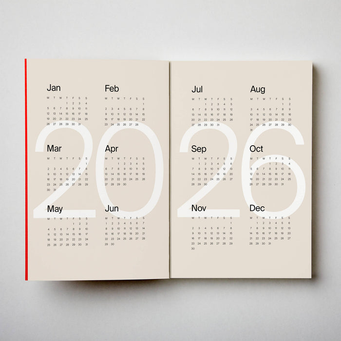 Calendar open to show the years 2026 on a plain background. 2026 Diary Red | Kinshipped |Shop Fodder