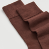 Pair of brown knee-high socks on a light gray background | Pairs Socks | Shop Fodder
