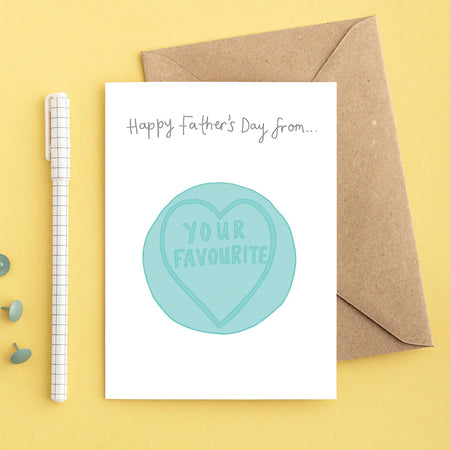 Father's Day card with heart design and envelope on a yellow background
