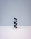 Checkered box with blue and white pattern on a light gray background. Nerikomi Vase | Fern Taylor | Shop Fodder