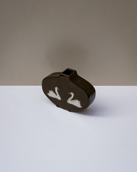 Handbuilt medium nerikomi swan vase by Fern Taylor in layered coloured stoneware with a crackle gloss glaze. Fodder