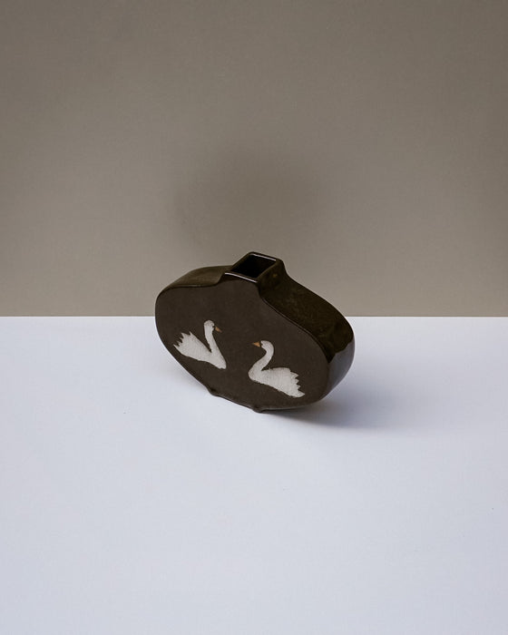 Handbuilt medium nerikomi swan vase by Fern Taylor in layered coloured stoneware with a crackle gloss glaze. Fodder
