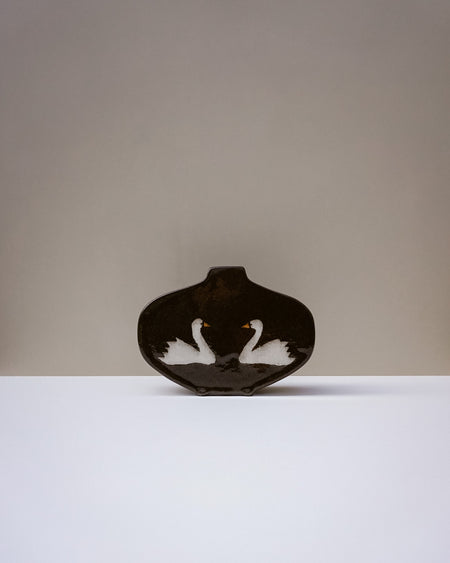Handbuilt medium nerikomi swan vase by Fern Taylor in layered coloured stoneware with a crackle gloss glaze. Fodder
