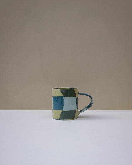 Handbuilt nerikomi check coffee mug by Fern Taylor in layered coloured stoneware. Fodder.