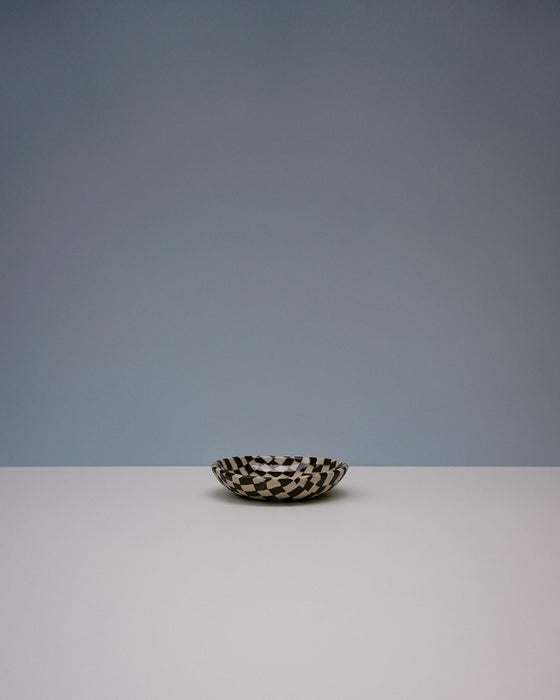 Small ceramic dish with black and white pattern on a light gray background. Fern Taylor | Nerikomi Dish | Shop Fodder