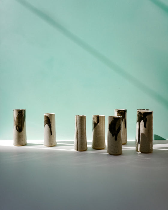 Sunlit group of Stem Vases. Janne Meier Ceramics | Wildflower Pebble Vase | Shop Fodder