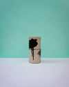 Two cylindrical containers with black abstract designs on a light blue background.  Janne Meijer Ceramics | Shop Fodder