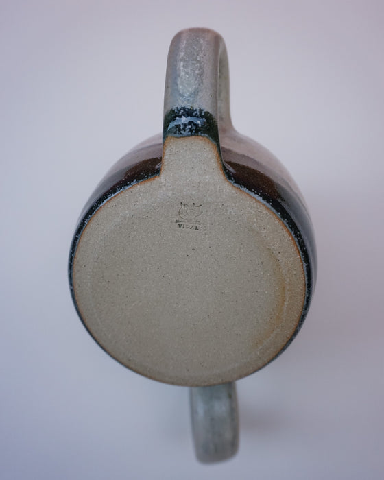 Ceramic mug with a handle on a white background. Liz Vidal Ceramics | Shop Fodder