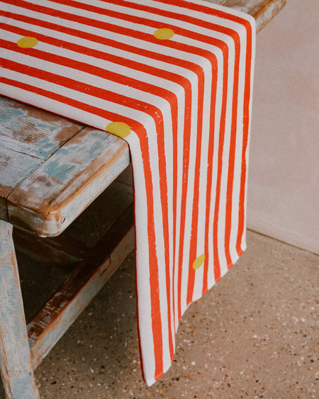 Cirque table runner by Nic Brittin - red stripe yellow dots - Fodder