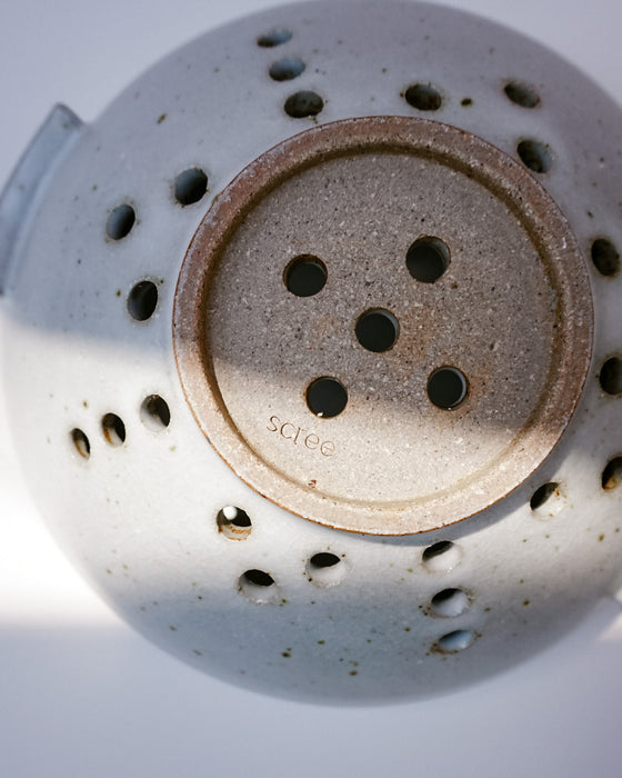 base of the handmade ceramic colander by Scree Ceramics showing the makers mark | Fodder