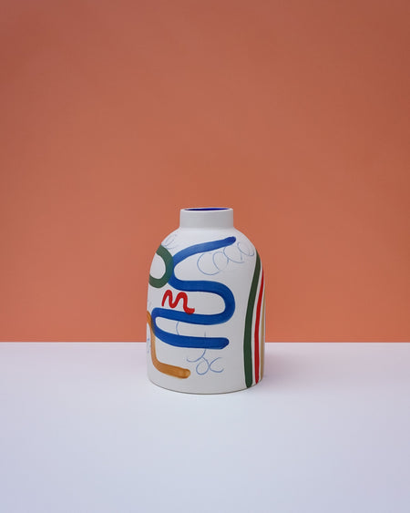 Decorative vase with abstract design on a peach background. Sophie Alda | Handmade Ceramics | Shop Fodder