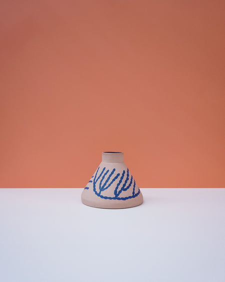 Ceramic vase with blue patterns on a peach and white background. Sophie Alda | Handmade Ceramics | Shop Fodder