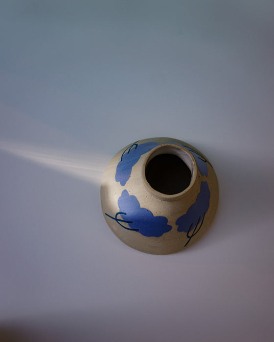 Ceramic vase with blue floral patterns on a light gray background. Sophie Alda | Handmade Ceramics | Shop Fodder