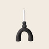 Small handmade sculptural black candlestick holder by HoodMor Ceramics in a black textured clay. 