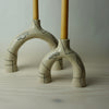 Sculptural candlestick holder in a cream stoneware with line drawing by HoodMor Studio. 