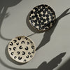 two flat handmade ceramic dishes on a table in the sunshine. . Trinket Dish | Jode Pankhurst | Shop Fodder