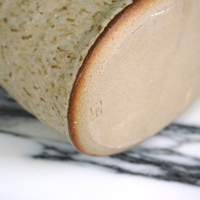 the base of a ceramic vase with the maker mark of Lily Pearmain. 