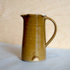 a nicotine brown colour milk jug from the side. Milk Jug | Lily Pearmain | Shop Fodder
