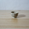 Mae Ceramics Handmade Egg Cup in grid pattern. 