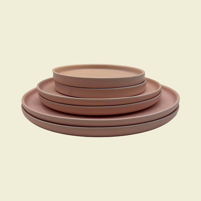 Stack of Feldspar Pink Plates by Dor & Tan