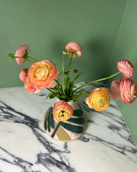 a bunch of pinky yellow flowers in a hand painted vase. Sophie Alda | Handmade Ceramics | Shop Fodder