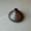 a dark bud vase in a rich tobacco colour. 