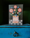 Greeting card with floral design and 'Deepest Gratitude' text on a blue surface. Make your own thank you cards | Hadley Paper Goods | Fodder