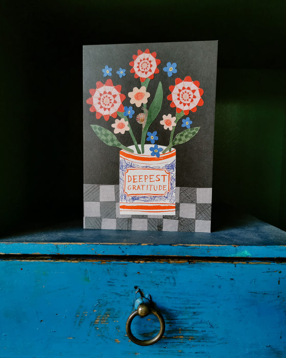 Greeting card with floral design and 'Deepest Gratitude' text on a blue surface. Make your own thank you cards | Hadley Paper Goods | Fodder
